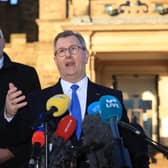 DUP leader Sir Jeffery Donaldson MP (right) and party colleague Gavin Robinson MP speak to the media today at Parliament Buildings in Stormont, Belfast. Sir Jeffrey predicted the green lane element of the Windsor Framework “will go” as he expressed hope that the Stormont powersharing institutions can be restored within days