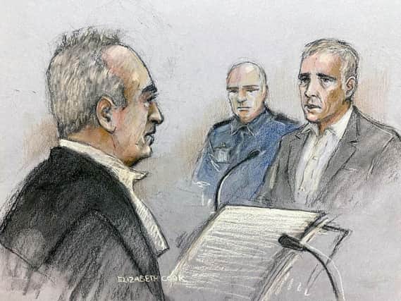 Court artist sketch by Elizabeth Cook of former Sinn Fein councillor Jonathan Dowdall being cross examined by Mr Hutch's defence barrister, Brendan Grehan SC during the trial  at the Special Criminal Court, Dublin, of Gerry "The Monk" Hutch for the murder of David Byrne at a hotel in Dublin in 2016

NOTE TO EDITORS: This handout photo may only be used in for editorial reporting purposes for the contemporaneous illustration of events, things or the people in the image or facts mentioned in the caption. Reuse of the picture may require further permission from the copyright holder.