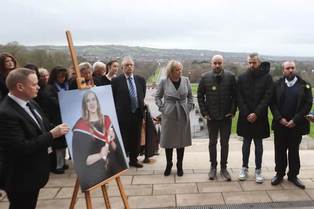 Sinn Fein vice president Michelle O'Neill with Natalie McNally's brothers (left to right) Declan, Niall and Brendan during a vigil for women who have died in violent circumstances  outside the Parliament Buildings, Belfast