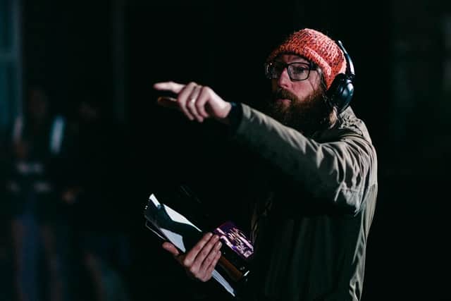 Director Dominic O'Neill at work behind the scenes of his 2024 horror film 'Haunted Ulster Live'. Photo: Beyond Visible Films