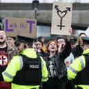 Pro-transgender activists protest against a rally called 'Let Women Speak' in Belfast in April 2023, which was called in opposition to trans ideology; there has been a huge upsurge in the numbers of children claiming to be transgender in recent years