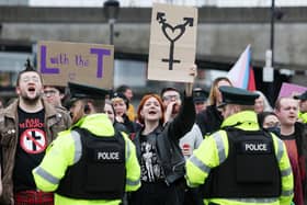 Pro-transgender activists protest against a rally called 'Let Women Speak' in Belfast in April 2023, which was called in opposition to trans ideology; there has been a huge upsurge in the numbers of children claiming to be transgender in recent years