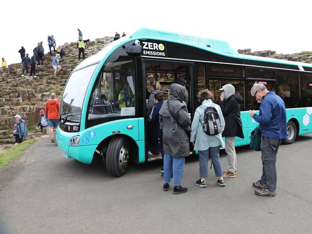 Passengers boarding  Translink's new zero emission minibus at Giant's Causeway. (Photo - Tom Heaney, nwpresspics)