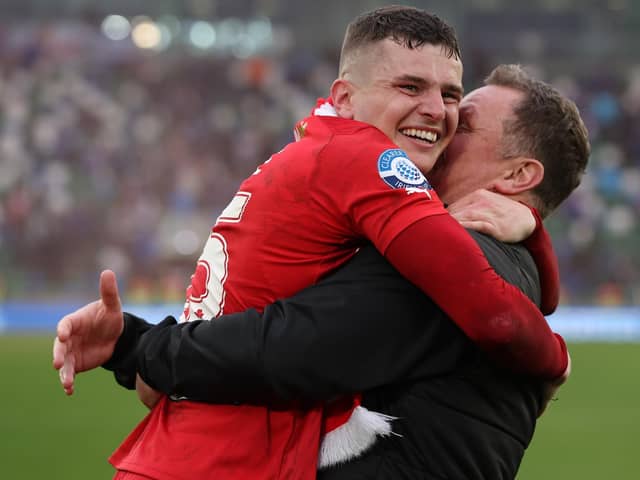 Ronan Hale celebrates with Jim Magilton after winning the Irish Cup. PIC: Desmond Loughery/Pacemaker Press