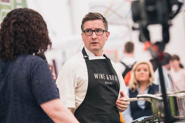 Chris McGowan, chief/owner of Wine and Brine Michelin Bib Gourmand restaurant in Moira, a Taste of Ulster plaque holder, pictured conducting a food demo at the Balmoral Show