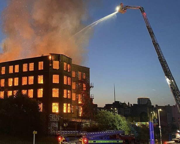 Multiple roads have been closed in Belfast city centre following a large fire at a building on Samuel Street.
The Northern Ireland Fire and Rescue Service (NIFRS) said it was called to the blaze at 02:40 BST on Wednesday.
