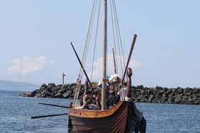 The Sea Dragons Viking longboat arriving on Rathlin Island