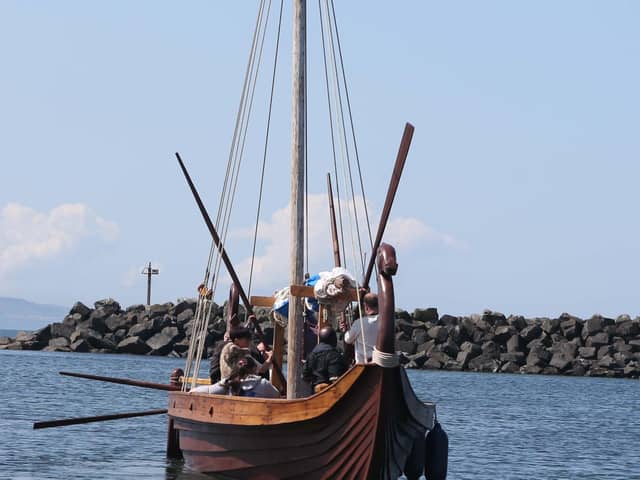 The Sea Dragons Viking longboat arriving on Rathlin Island