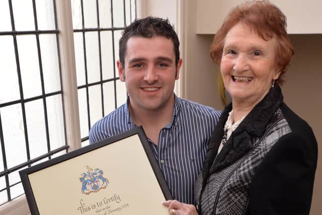 Michael Dunlop is congratulated on receiving the Freeman of the Borough of Ballymoney by his grandmother May in 2014. The 24 year old, who received the award after winning four Isle of Man TT races in 2013,  followed in the footsteps of his famous Uncle Joey and his late father Robert, who became Freemen of the Borough in 1993 and 2007 respectively.
PICTURE BY STEPHEN DAVISON