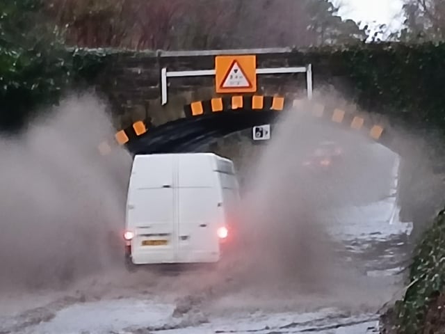 This van confidently charged through the flooding at Clandeboye, sending in water spraying on either side. Pic by Ben Lowry on Saturday January 17 2026