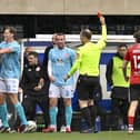 Larne’s Chris Gallagher is awarded a red card for a tackle on Elliot Dunlop. (Photo by INPHO/Stephen Hamilton)