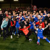 Larne’s players and fans pictured after they win the football league after Friday nights game at Seaview in Belfast.