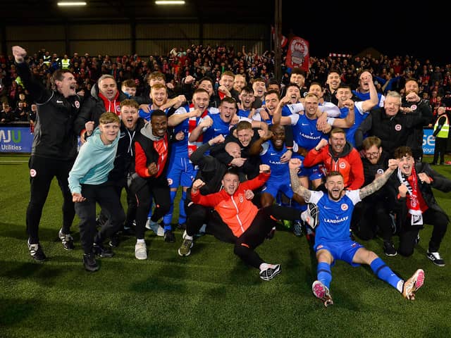 Larne’s players and fans pictured after they win the football league after Friday nights game at Seaview in Belfast.