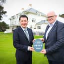 David Roberts, director of strategic development at Tourism NI with Stephen Meldrum, general manager of Dunluce Lodge, which has been awarded five stars by Tourism NI’s Quality Grading Scheme