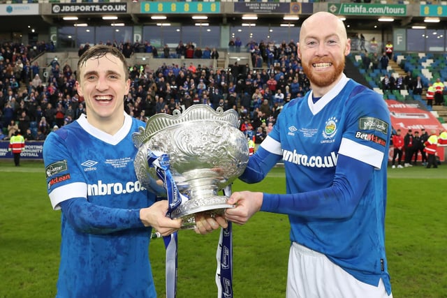 Linfield goalscorers Joel Cooper and Chris Shields celebrate with the cup