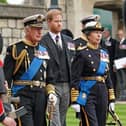 King Charles III, Prince Harry, Duke of Sussex and Princess Anne, Princess Royal arrive at the Committal Service held at St George's Chapel in Windsor Castle on September 19, 2022 in Windso