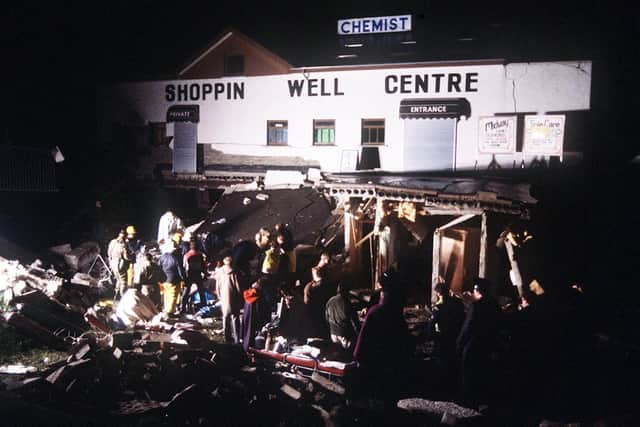 People attempt to rescue those trapped and injured after the INLA bomb attack at the Droppin Well pub which killed 17 people 40 years ago this week. Photo: Pacemaker.