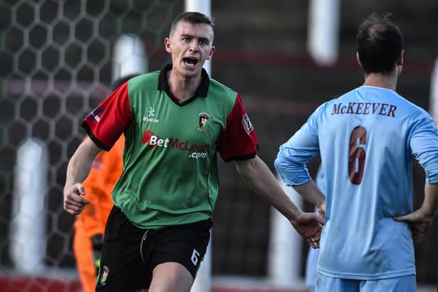 Jay Magee celebrates scoring for Glentoran against Institute in November 2014. PIC: Russell Pritchard / Presseye