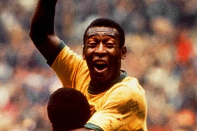 Pele, Brazil, celebrates with Jairzinho