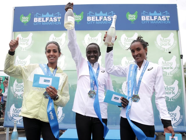 Moy Park Belfast City Marathon Womens race (L-R) second place Laila AZIZA ALAOUI SELSOULI, first place Kenya’s Beatrice Jepkemei and third place Shewaye Woldemeskel