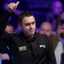 Ronnie O'Sullivan has reached the semi-final of the Tour Championship after a 10-2 victory against Ali Carter