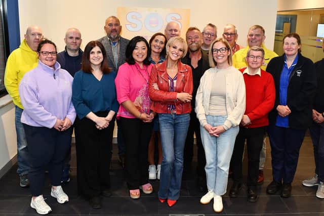 Actor Richard Dormer with members of the SOS NI team