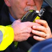 A general image of the PSNI breath-testing a driver; Charles McDonagh's legal challenge to his conviction on human rights grounds has been totally rubbished by Belfast's High Court