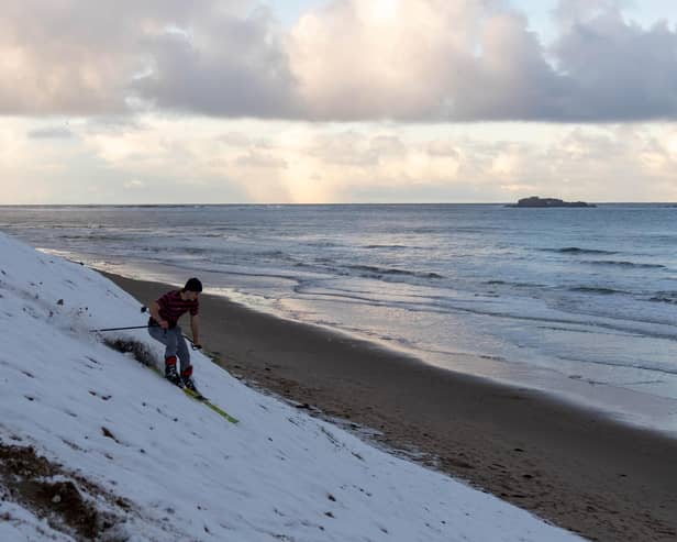 Cameron Leighton from Causeway Coastering in Portrush takes advantage of the ski while also enjoying the surf on the same day