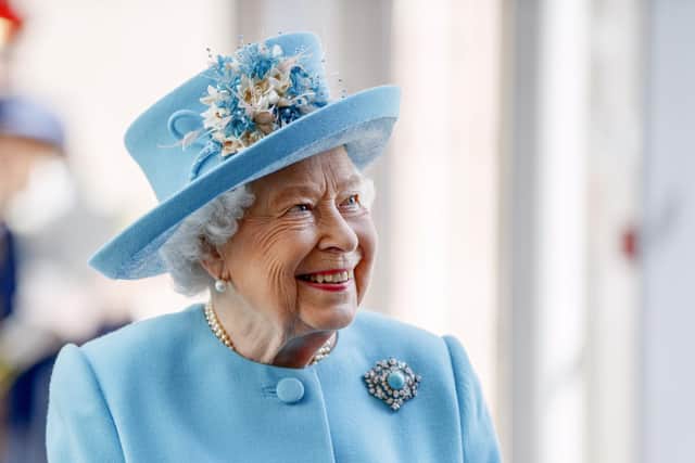 Queen Elizabeth II smiles during a visit to the headquarters of British Airways at Heathrow Airport, London, to mark her centenary year.