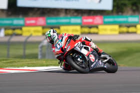 David Allingham won the National Superstock 1000 race at Donington Park on the SMS/Nicholl Oils BMW. (Photo by Ian Hopgood)