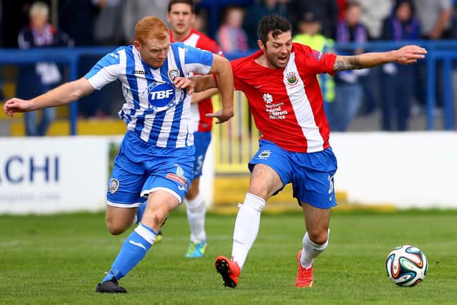 Joe McNeill in action for Coleraine against Linfield's Ivan Sproule in August 2014. PIC: William Cherry / Presseye