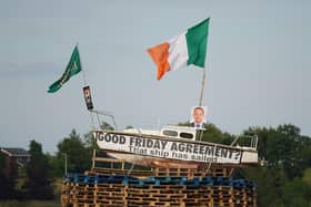 A pyre with a boat on top, with a picture of Taoiseach Leo Varadkar and a banner that reads "Good Friday Agreement ? That ship has sailed", before it is set alight in Moygashel near Dungannon, Co Tyrone