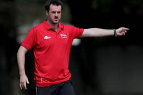 Chris Parker's Armagh hold a slender one-point lead at the top of AIL Division 1B with four games left.