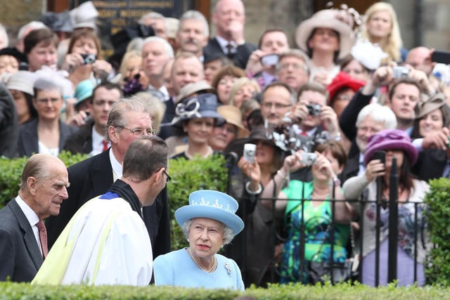 Queen Elizabeth II and the Duke of Edinburgh leave St. Macartin's Cathedral in Enniskillen, County Fermanagh, during a two-day visit to Northern Ireland as part of the Diamond Jubilee tour.