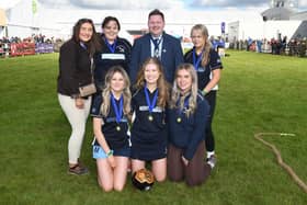 Women's five-a-aside football winners, Newtownstewart with YFCU president Stuart Mills at this year's Balmoral Show