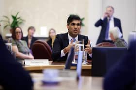 Prime Minister Rishi Sunak at Stormont Castle to mark the return of power sharing on February 5. Saying that there is no sea border helps him and Sir Jeffrey Donaldson, not unionism. ​One reason for the unionist support for the deal is that it is widely believed that the Irish Sea border has been removed when it hasn’t been. Photo by Kelvin Boyes / Press Eye