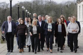 Northern Ireland First Minister Michelle O'Neill (third right) with her Sinn Fein party MLA colleagues outside Parliament Buildings at Stormont on Tuesday