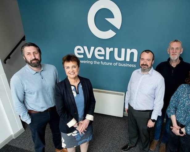 Belfast energy management firm Everun makes major investment to double workforce and target new markets. Pictured are Grainne McVeigh, director of advanced manufacturing and engineering, Invest NI, Ross Moffett, sales and business development director, Everun, Michael Thompson, managing director, Everun, Ian Hutchinson, head of operations, Everun and Eimear O'Reilly, head of professional services, Everun