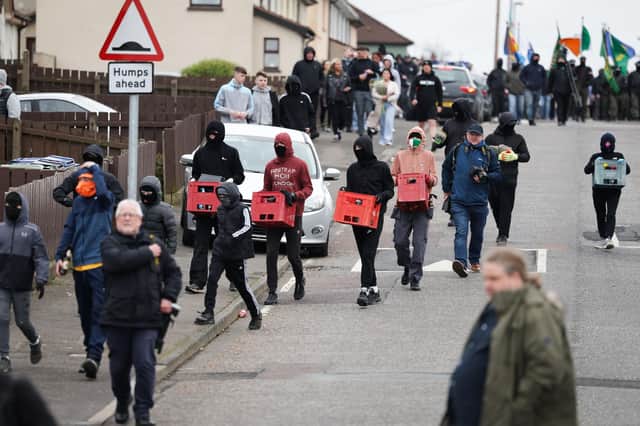 Republican youths with petrol bombs at the annual 1916 Easter Rising parade in the Creggan area of Londonderry. Photo: Kelvin Boyes/Press Eye