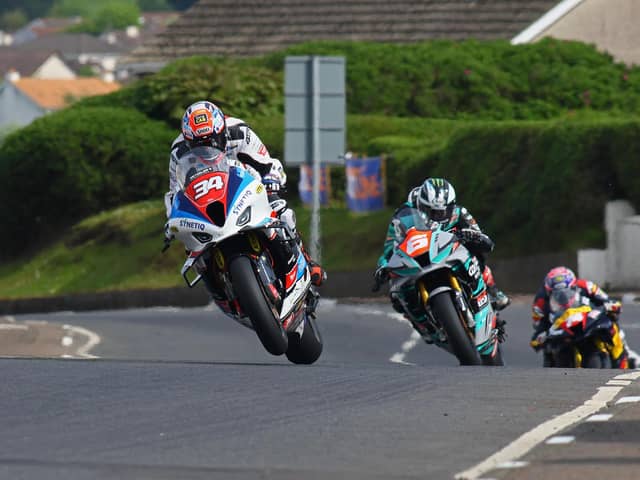 Alastair Seeley (SYNETIQ BMW) leads Michael Dunlop (Hawk Racing Honda) in the Superstock race on Saturday