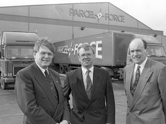 Parcel Force director Jim Woodman, centre, opens the new sorting centre at Belfast Harbour Industrial Estate, at the end of February 1992, with Jim Prentice, area operations manager for Northern Ireland and Scotland, left, and another unnamed colleague. Picture: News Letter archives