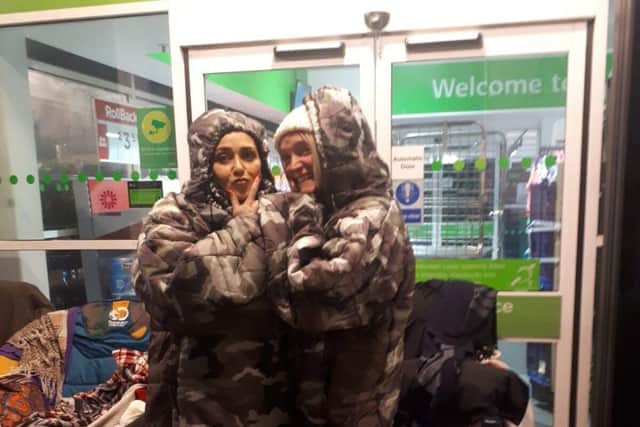 Helping Hands volunteers outside Asda Dundonald during the 24-hour charity sit out