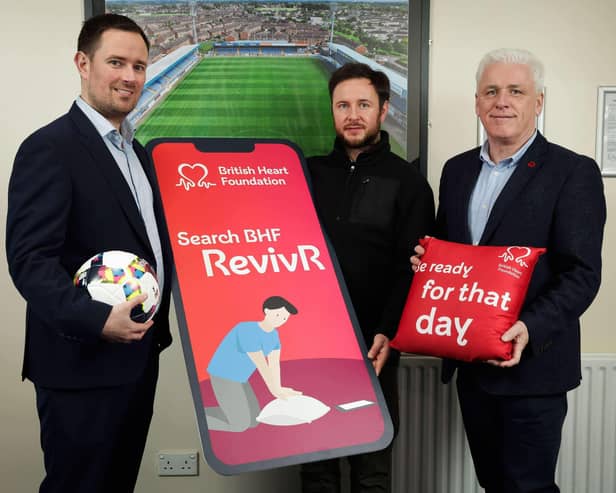 More than 1500 Irish League football players and coaches and almost 10,000 supporters in Northern Ireland will be given the opportunity to learn vital lifesaving skills during Heart Month in February. The Northern Ireland Football League (NIFL) has teamed up with the British Heart Foundation Northern Ireland (BHF NI) to promote the charity’s free and innovative online CPR training tool RevivR. Pictured at the launch at Glenavon Football Club are (L-R) NIFL’s head of Communications Neil Coleman, Glenavon FC manager Stephen McDonnell and head of BHF NI Fearghal McKinney.