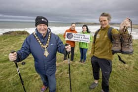 The Mayor of Causeway Coast and Glens Borough Council, Councillor Ivor Wallace, launches the Causeway Coast and Glens Walking Festival along with Lorcan McBride from local activity provider Far and Wild, Coast and Countryside Officer Mark Strong and Trade Engagement Officer Siobhan McKenna. The Causeway Coast and Glens Walking Festival takes place from March 31st to April 2nd with a range of inspiring guided walks through the area’s dramatic landscapes. Go to www.visitcausewaycoastandglens.com/whats-on to find out more.