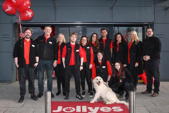 99th Jollyes store opens at Connswater Retail Park, Belfast. Pictured are staff and social media sensation Maddie, the Golden Retriever, and Jollyes’ mascot Jolly