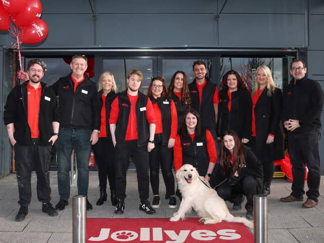 99th Jollyes store opens at Connswater Retail Park, Belfast. Pictured are staff and social media sensation Maddie, the Golden Retriever, and Jollyes’ mascot Jolly