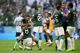 LUSAIL CITY, QATAR - NOVEMBER 22: Saudi Arabia players celebrate the 2-1 win during the FIFA World Cup Qatar 2022 Group C match between Argentina and Saudi Arabia at Lusail Stadium on November 22, 2022 in Lusail City, Qatar. (Photo by Matthias Hangst/Getty Images)