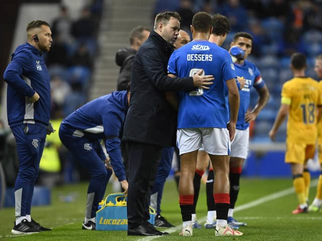 Rangers manager Michael Beale speaks to Cyriel Dessers during a Viaplay Cup Quarter-final match between Rangers and Livingston at Ibrox
