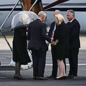 King Charles III and the Queen (left) are greeted at at Aberdeen Airport before boarding a plane travel to London following the death of Queen Elizabeth II on Thursday. Picture date: Friday September 9, 2022. PA Photo. See PA story DEATH Queen. Photo credit should read: Aaron Chown/PA Wire