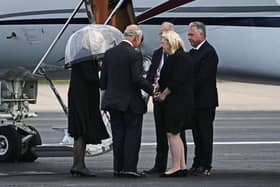 King Charles III and the Queen (left) are greeted at at Aberdeen Airport before boarding a plane travel to London following the death of Queen Elizabeth II on Thursday. Picture date: Friday September 9, 2022. PA Photo. See PA story DEATH Queen. Photo credit should read: Aaron Chown/PA Wire